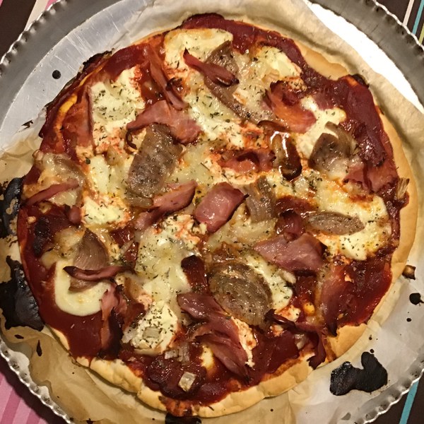 Three cheese three meat pizza
